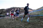 Yemaneberham Grippa (Europe) leads the junior mens 4k BUPA Great Edinburgh Cross Country. Photo: David T. Hewitson/Sports for All Pics